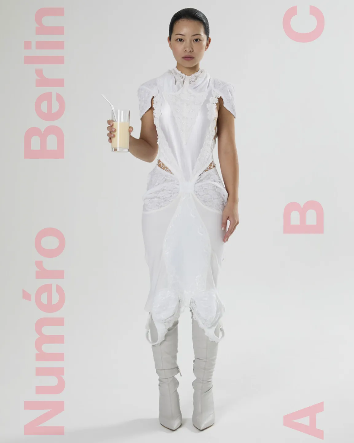 Cover von Numéro Berlin: TingTing Lai in einem weißen skulpturalen Kleid mit einem Glas Milch (shotview.com)