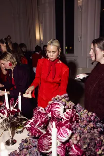 Guests at the buffet with radicchio and candles