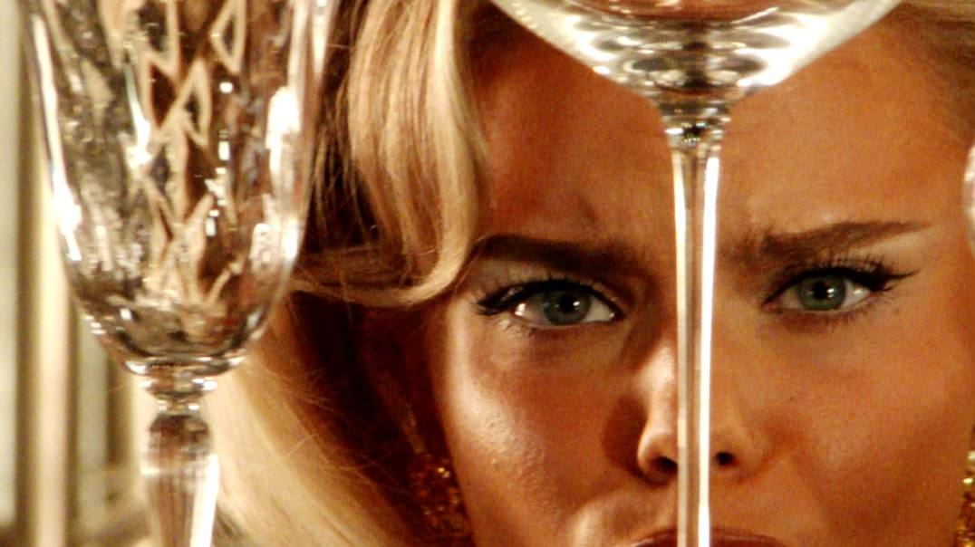 Close-up of Aliona Gris frowning through crystal glasses, a scene from The Intense Diaries